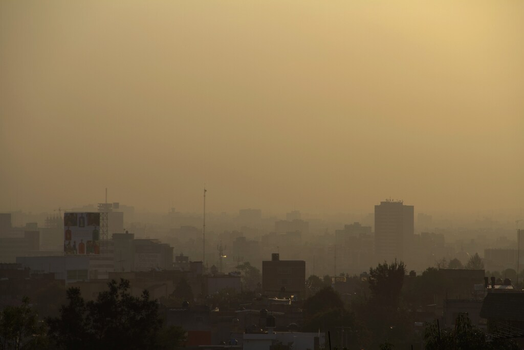 Mexico City is seen through heavy smog in the early morning.