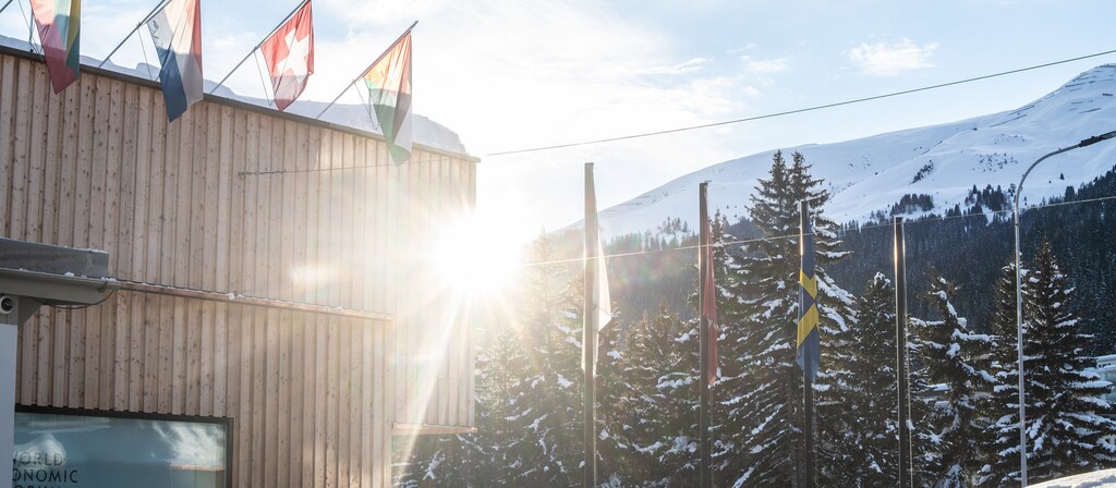 Bright spots in a 50-year Davos history include a handshake that sealed the end of apartheid