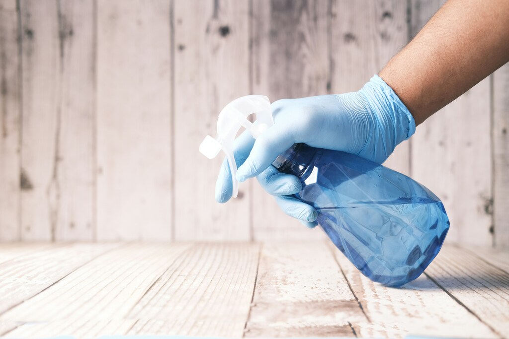 side view of a bottle of surface cleaner in blog about how household goods industry can work towards nature-positive world