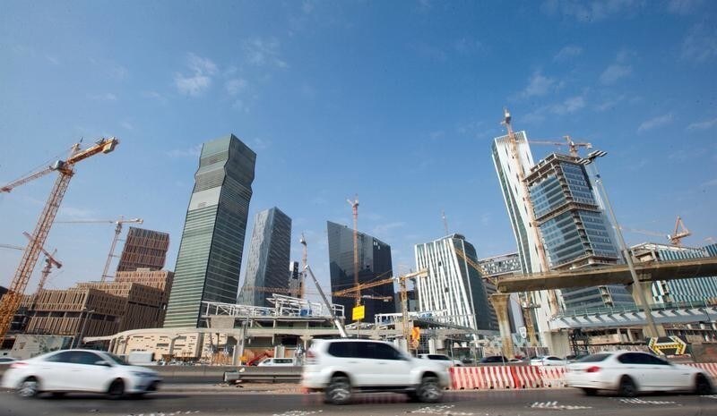 Cars drive past the King Abdullah Financial District in Riyadh, Saudi Arabia, November 12, 2017. Picture taken November 12, 2017. REUTERS/Faisal Al Nasser - RC1DED060740