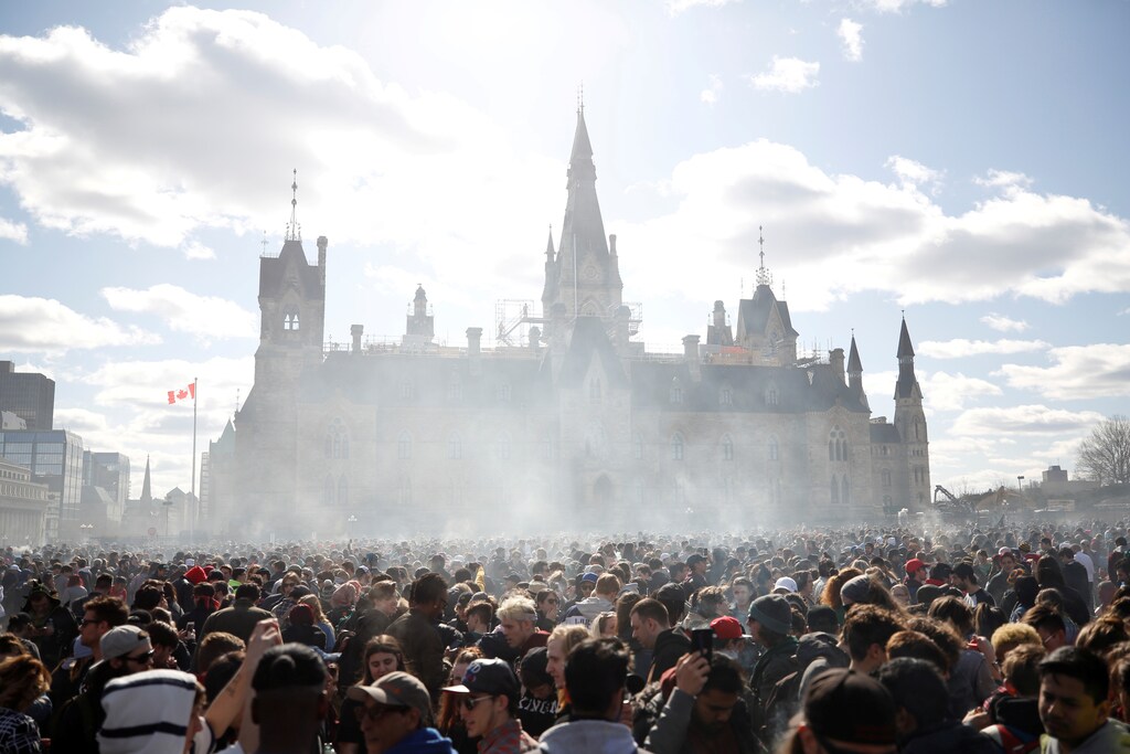Smoke rises during the annual 4/20 marijuana rally on Parliament Hill in Ottawa, Ontario, Canada, April 20, 2018. REUTERS/Chris Wattie TPX IMAGES OF THE DAY - RC1756F8D8C0