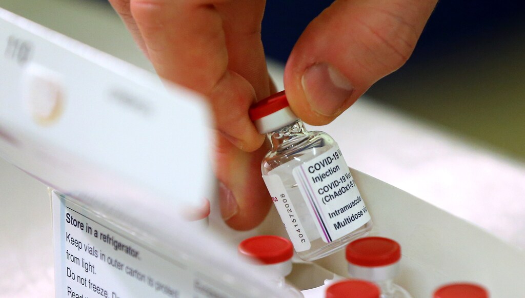 Dose of the Oxford University/AstraZeneca COVID-19 vaccine is displayed from its box at the Princess Royal Hospital in Haywards Heath, West Sussex, Britain January 2, 2021. Picture taken January 2, 2021.
