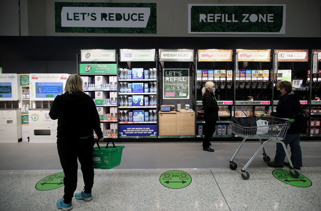 The 'Refill Zone' is seen in the UK supermarket Asda, as the store launches a new sustainability strategy, in Leeds, Britain, October 19, 2020. Picture taken October 19, 2020. REUTERS/Molly Darlington - RC27MJ9NR2B9