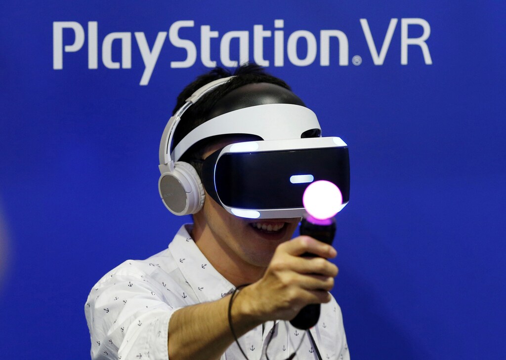 A man plays a video game with Sony's PlayStation VR headset at Tokyo Game Show 2016 in Makuhari, east of Tokyo, Japan, September 15, 2016.