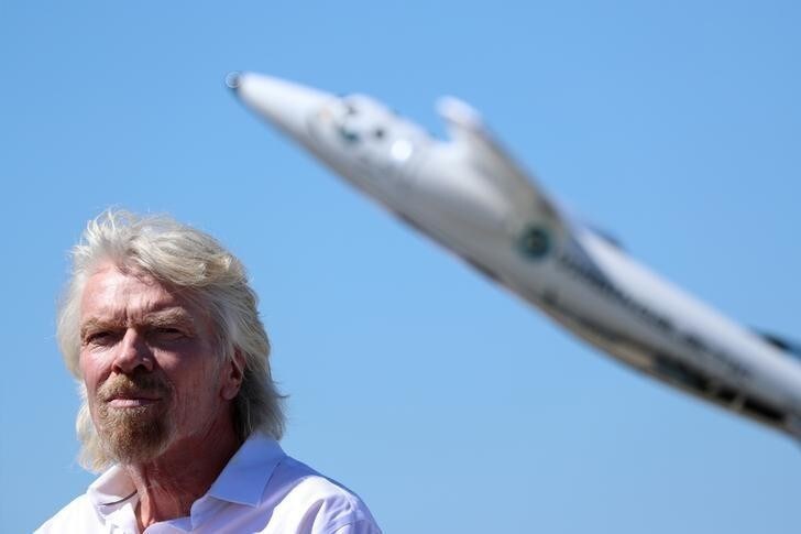 Richard Branson listens to speeches as he is inducted into the Flight Path Walk of Fame at Los Angeles Airport Flight Path Museum, highlighting his accomplishments in aviation and aerospace in Los Angeles, California, U.S. March 28, 2018. REUTERS/Mike Blake