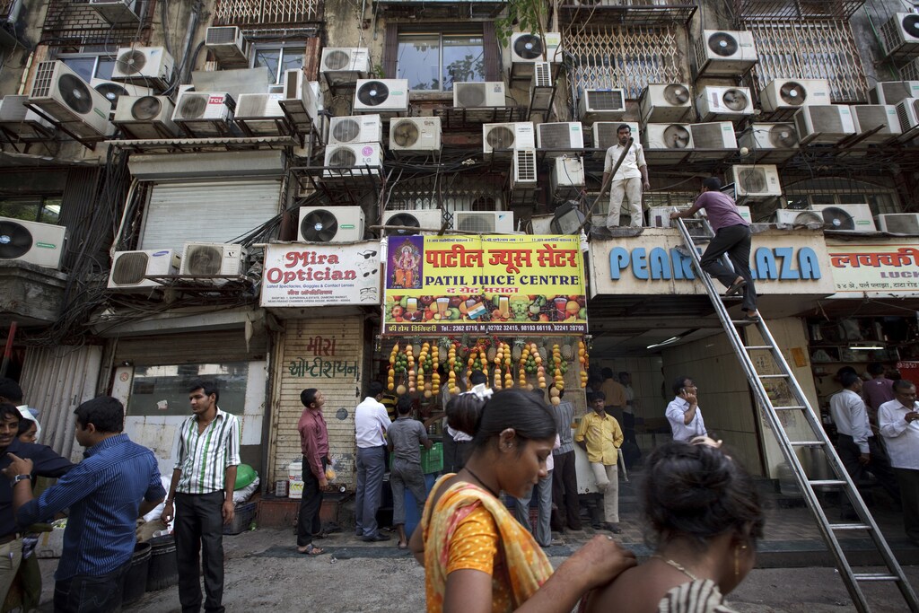 Congested air conditioning units on a building in central Mumbai in India on May 21, 2012(Photo by Kuni Takahashi)