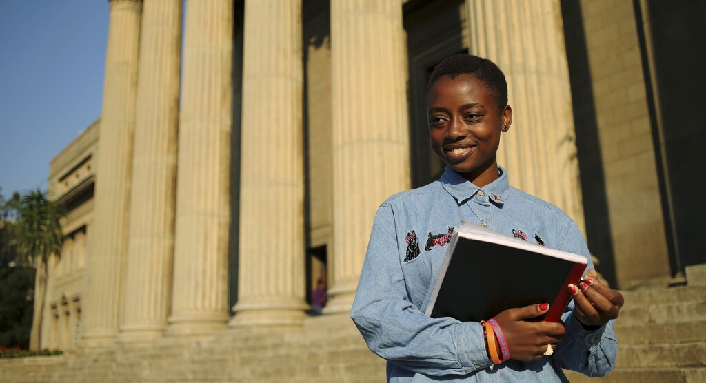 Second-year civil engineering student and first-time voter Nkululeko Simelane poses for a picture at Wits University in Johannesburg, April 22, 2014.