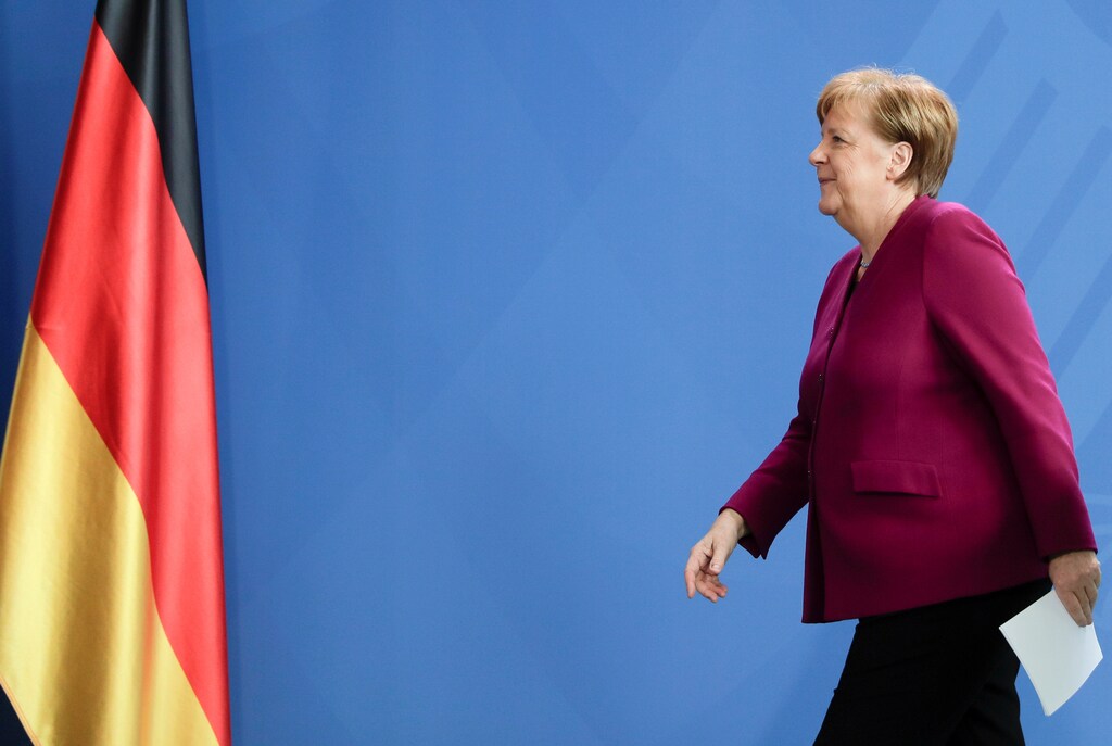 German Chancellor Angela Merkel leaves after a media briefing about measures of the German government to avoid the further spread of the coronavirus disease (COVID-19), at the chancellery in Berlin, Germany, April 9, 2020. Markus Schreiber/Pool via REUTERS - RC221G9C9THB