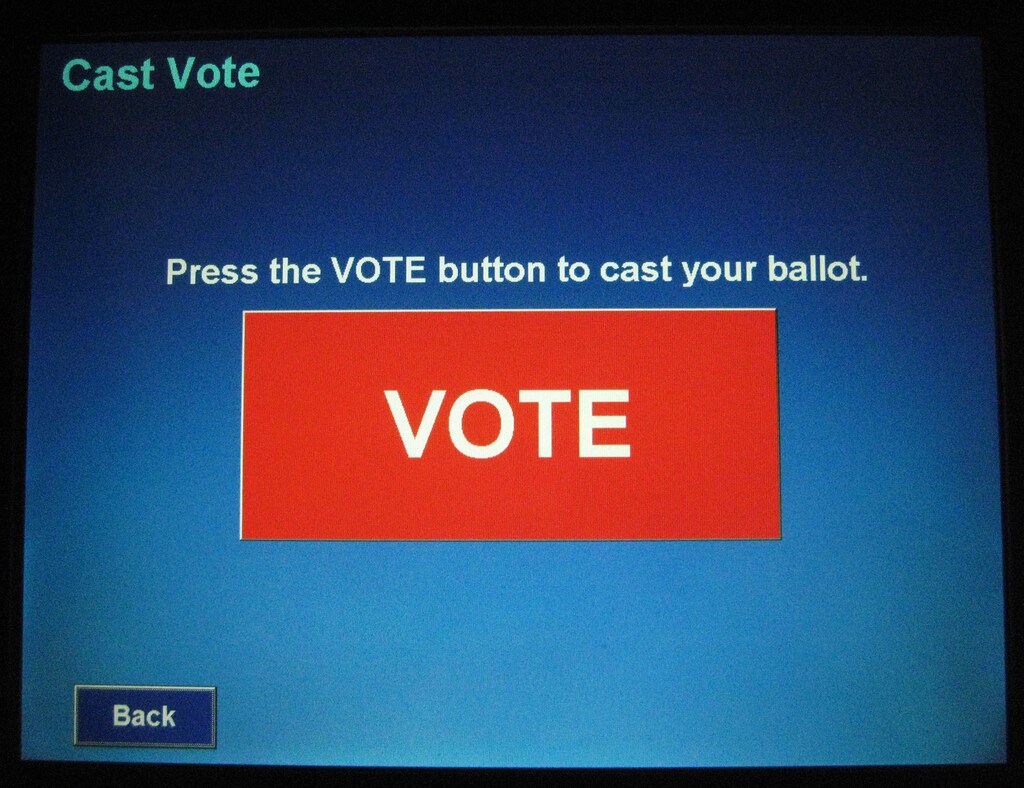 A Touch Screen Voting Machine displays the final button to complete casting a ballot at a "In-Person Absentee Voting" location at McLean Governmental Center in McLean, Virginia, U.S. on October 25, 2008. REUTERS/Hyungwon Kang/File Photo - TM3EC980XVB01