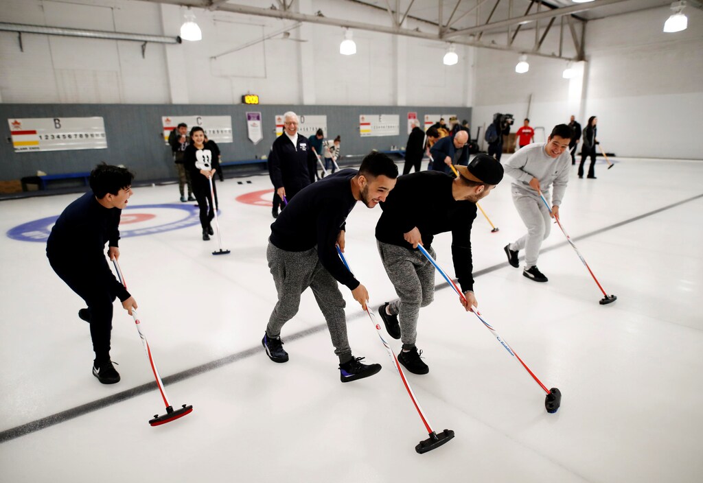 A refugee family from Afghanistan resettled in Canada are introduced to the sport of curling