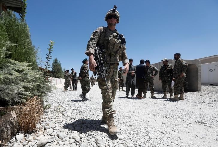 An U.S. soldier keeps watch at an Afghan National Army (ANA) base in Logar province, Afghanistan August 5, 2018. REUTERS/Omar Sobhani