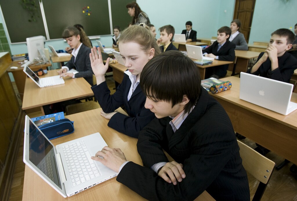 Students use laptop computers during class in a school in Kaliningrad February 18, 2008. Dmitry Medvedev, the man almost certain to be elected as Russia's new president next weekend, has for the past two years been overseeing four "national projects" to reform healthcare, education, housing and agriculture. The projects are the biggest political undertaking the technocrat Medvedev has had to handle to date, and his management of them gives an insight into how he will perform when he takes over from his mentor Vladimir Putin as president. Kaliningrad, which was annexed from Germany at the end of World War Two, is precisely the sort of place the national projects set out to help. Picture taken February 18, 2008. To match feature RUSSIA-ELECTION/PROJECTS REUTERS/Sergei Karpukhin (RUSSIA) - GM1E42R01U701