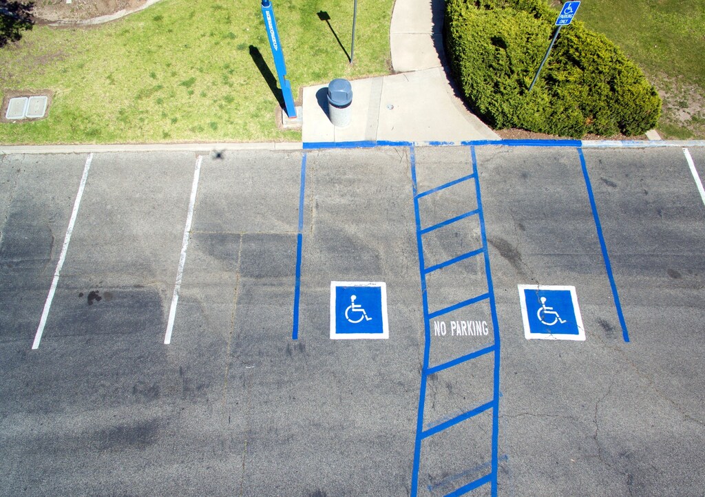 Two parking spots reserved for people with disabilities.