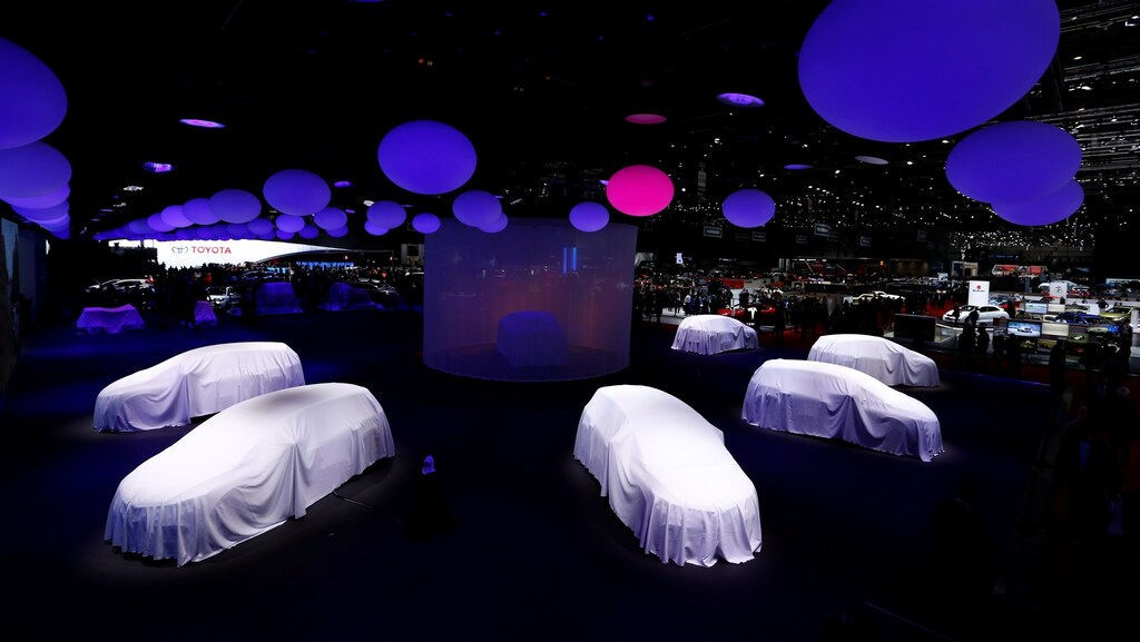 Covered cars are pictured at the stand of Renault at the 86th International Motor Show in Geneva, Switzerland, March 1, 2016.