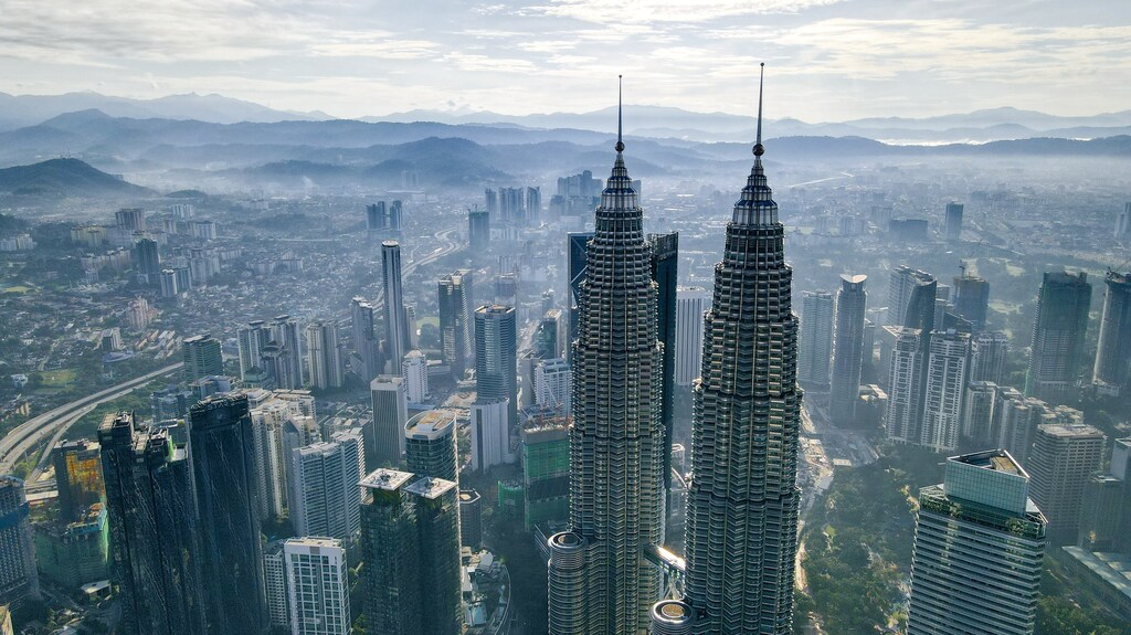 An immersive view of Kuala Lumpur, Malaysia around the Petronas Towers: Industrial clusters emerge as key drivers of national growth