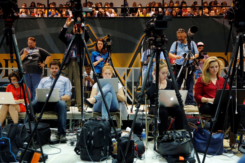 Journalists cover U.S. Democratic presidential candidate Bernie Sanders as he addresses supporters at a campaign rally in Lancaster, Pennsylvania, U.S., April 22, 2016.
