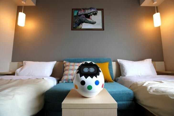 Tapia, a concierge robot through which the hotel guests can control equipments in the room such as television, air conditioner or illumination by voice communication or touching the robot, is seen during a press preview for the newly-opening Henn na Hotel Maihama Tokyo Bay in Urayasu, east of Tokyo, Japan March 15, 2017. Japan's second robot-run hotel Henn na Hotel ( 'strange hotel' in Japanese) opened on March 15, 2017 as the robot-staffed hotel near Tokyo, operating company H.I.S. Co. said. REUTERS/Issei Kato