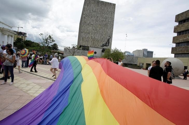 LGBT community members and activists demostrate in front of the Supreme Court of Justice, to demand for same-sex marriage, in San Jose, Costa Rica August 4,2018. Picture taken August 4, 2018. REUTERS/Juan Carlos Ulate