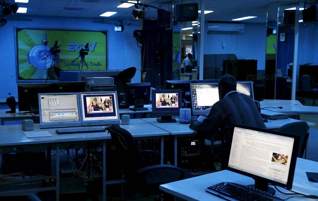Journalists work inside their Eritrea Television newsroom in the capital Asmara, February 20, 2016.