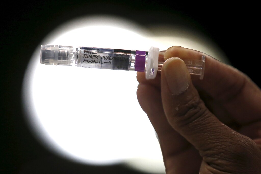 A nurse displays a flu vaccine at a free medical and dental health clinic in Los Angeles, California, U.S., April 27, 2016