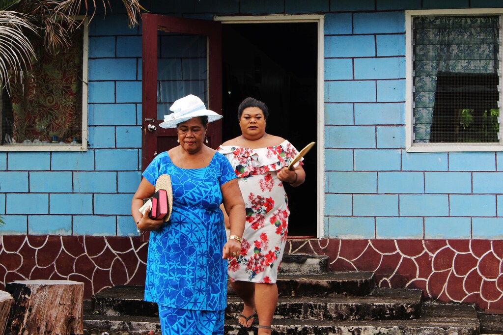 Samoan fa'afafine Keyonce Lee Hang and her mother Rona Tauli Lee leave the family home on their way to church on a Sunday morning in Upolu, Samoa, July 14, 2019. Picture taken July 14, 2019. REUTERS/Jonathan Barrett - RC184DE415D0