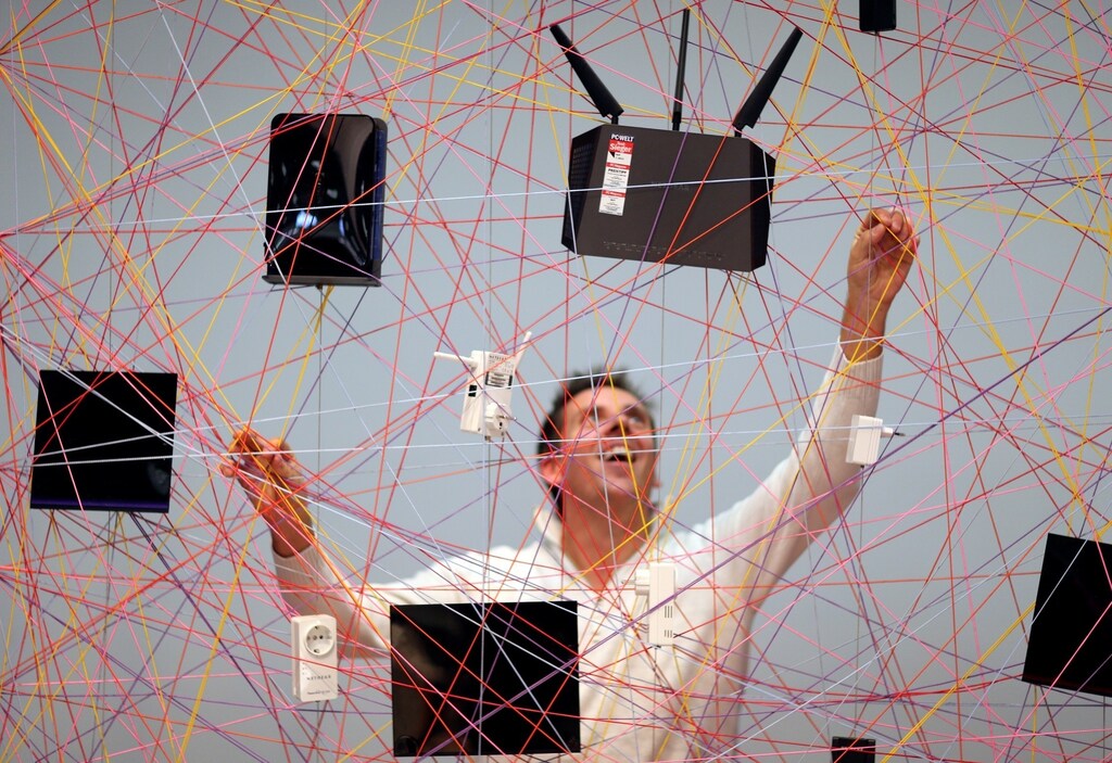 Devices produced by U.S. manufacturer of computer networking equipment Netgear are displayed on a web during the IFA Electronics show in Berlin September 4, 2014.
