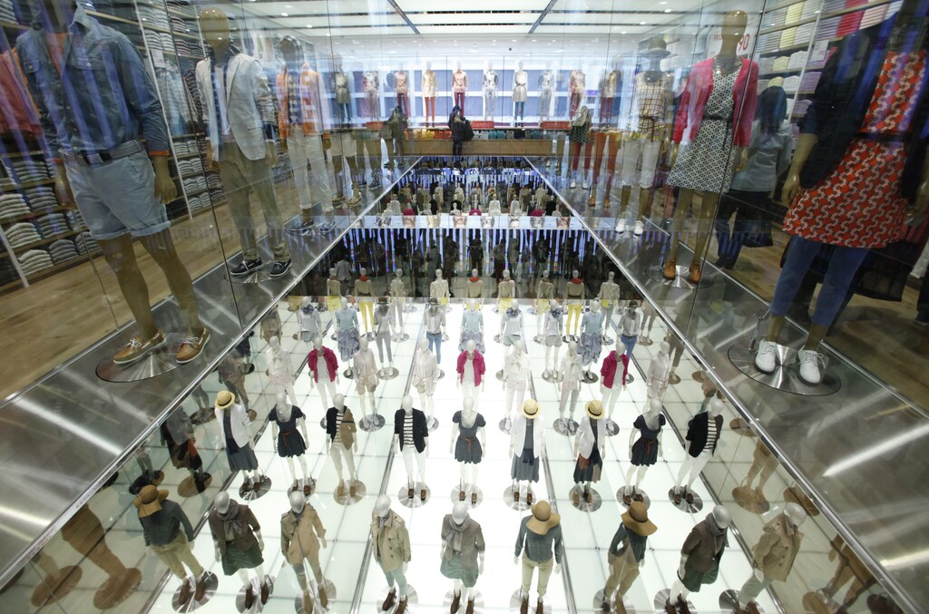 Mannequins are displayed at Fast Retailing's new flagship Uniqlo store at Tokyo's Ginza district March 16, 2012.