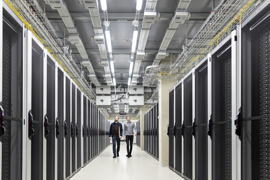 two men walk through Greenergy data centre in a story about EU energy efficiency