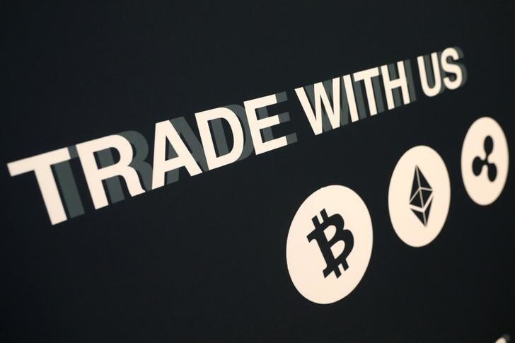A message on a vendor's booth is seen on display at the Consensus 2018 blockchain technology conference in New York City, New York, U.S., May 16, 2018. REUTERS/Mike Segar