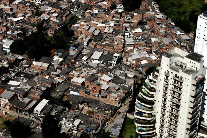 An aerial view of Paraisopolis, a slum consisting of some 60,000 residents, located in the Morumbi neighborhood of Sao Paulo, South America's biggest city and one of the three biggest metropolises in the world April 24, 2006. - PBEAHUNOSCL