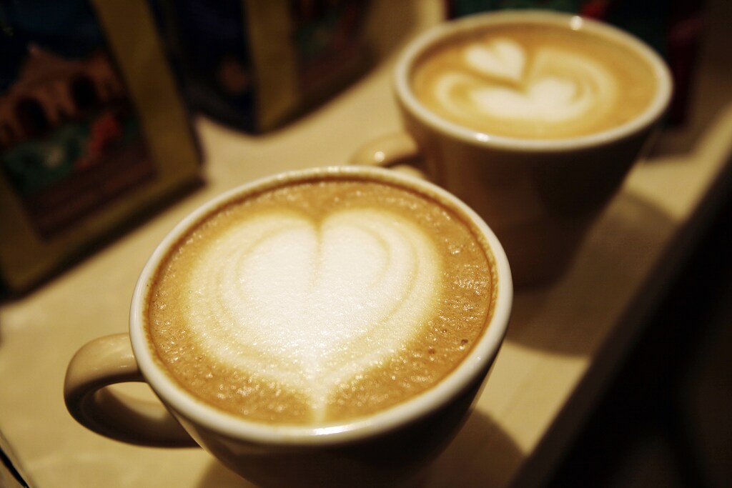 Cups of cappuccino sit on a table during the World Coffee Conference in Guatemala City February 26, 2010. Guatemala will produce less coffee than previously forecast in the 2009/10 season due to bad weather, increasing pressure on already tight global supplies, the head of the national growers group Anacafe said on Friday. REUTERS/Daniel LeClair (GUATEMALA - Tags: SOCIETY BUSINESS) - GM1E62R0JYM01