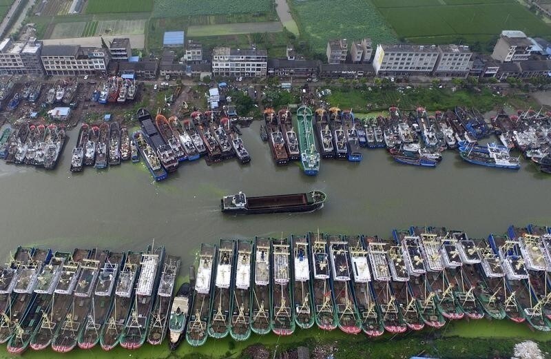 An aerial view shows boats being anchored in a bay as Typhoon Chan-Hom approaches Taizhou, Zhejiang province