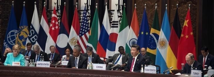 Chinese President Xi Jinping gives a speech during the opening ceremony of the G20 Summit while U.S. President Barack Obama, Russian President Vladimir Putin and German Chancellor Angela Merkel listen in Hangzhou, China, September 4, 2016.