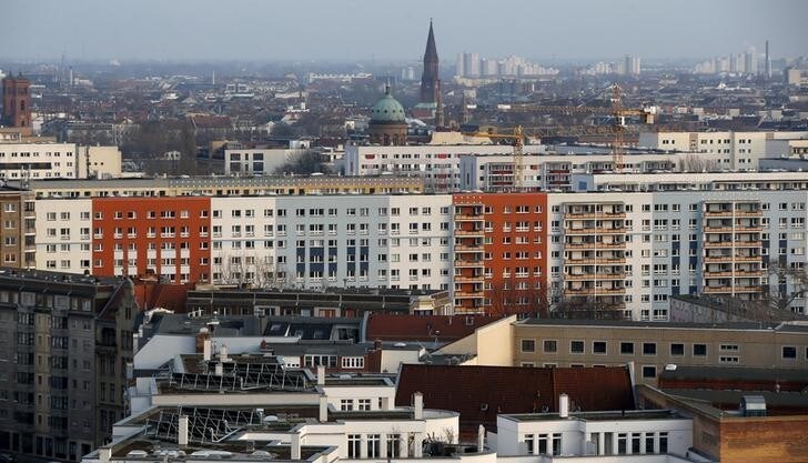 Apartment buildings with the Saint Michael church (C) are pictured at Berlin's Kreuzberg district, Germany, March 1, 2016. REUTERS/Fabrizio Bensch/File Photo
