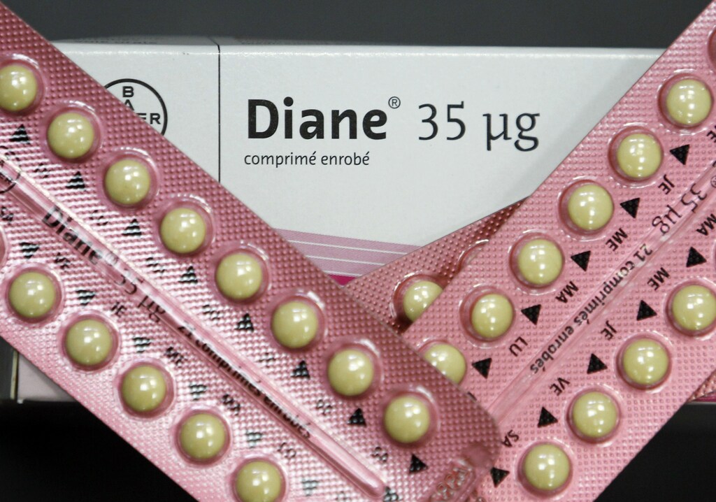 An illustration picture shows a box and blister-packs of acne drug Diane-35, which is also used as a contraceptive, in a pharmacy in Andernos, Southwestern France, January 30, 2013. France's health regulator on Wednesday said it would suspend acne pill Diane 35 and its generic versions within three months because it carries a high risk of blood clots. REUTERS/Regis Duvignau (FRANCE - Tags: HEALTH) - PM1E91U0YC201
