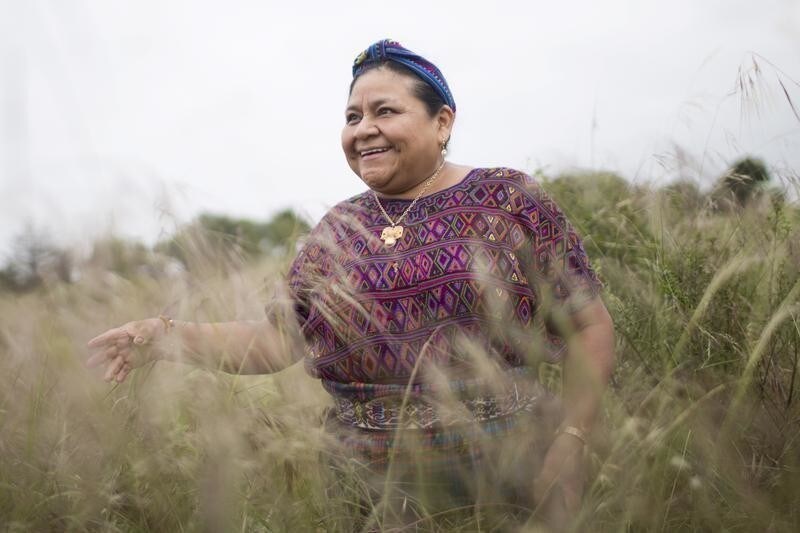 Guatemalan Nobel Peace laureate Rigoberta Menchu looks into a field during a habitat preservation and native plant restoration project for endangered burrowing owls with Google employees in Mountain View, California April 20, 2015.