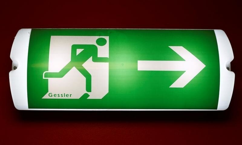An emergency exit sign is photographed in Frankfurt, Germany, May 14, 2016. REUTERS/Kai Pfaffenbach - RTSEH9U