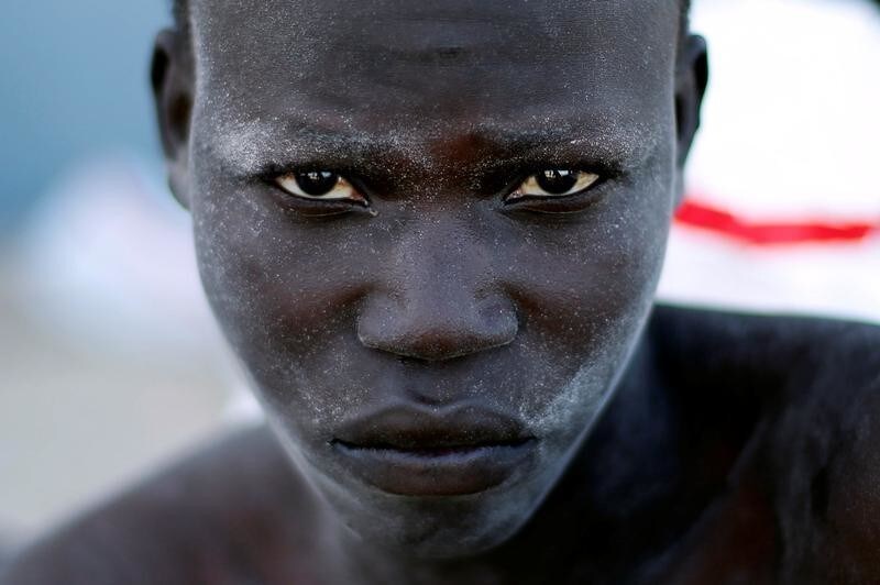 A migrant arrives at a naval base after he was rescued by Libyan coastal guards in Tripoli, Libya November 6, 2017. REUTERS/Ahmed Jadallah - RC13CDAA89E0