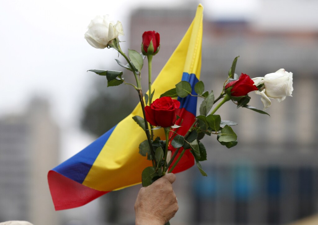 Demonstrators take part in a protest against the Revolutionary Armed Forces of Colombia (FARC).