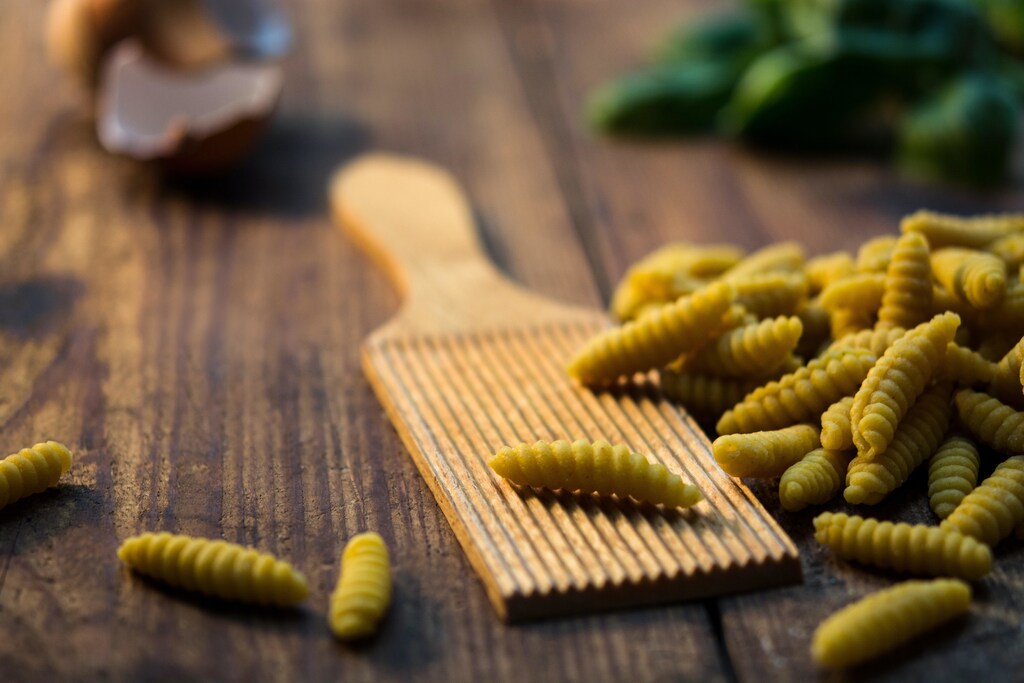 Pasta on a board.