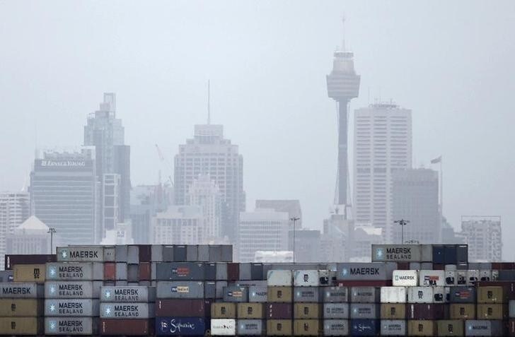 A container ship passes in front of the Sydney skyline as it departs from Port Botany terminal February 24, 2010. Australia and China resumed free trade talks on Wednesday, after a delay of more than a year. REUTERS/Tim Wimborne (AUSTRALIA - Tags: TRANSPORT BUSINESS POLITICS)