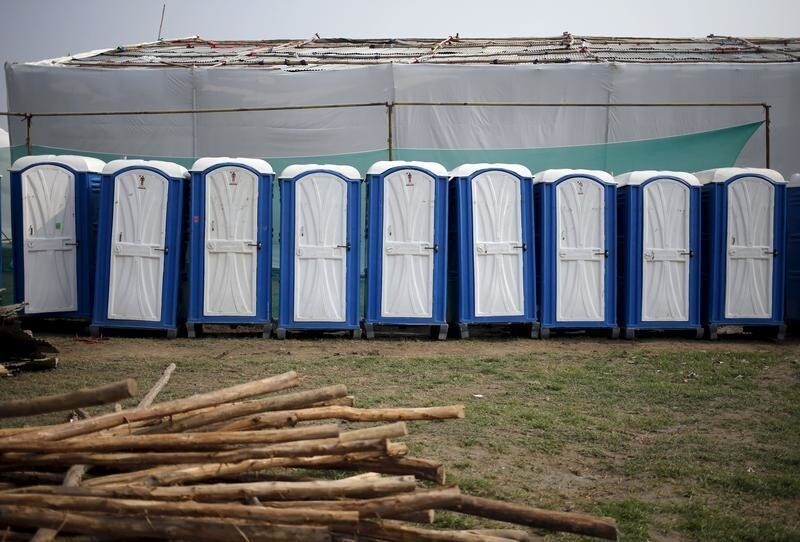 Temporary lavatories are seen at the venue of World Culture Festival on the banks of the river Yamuna in New Delhi, India, March 8, 2016. Indian environmentalists are aghast at the hosting of a huge cultural festival on the floodplain of Delhi's main river that begins on Friday, warning that the event and its 3.5 million visitors will devastate the area's biodiversity. Picture taken March 8, 2016. REUTERS/Anindito Mukherjee - GF10000339018
