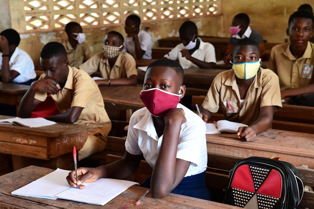 Emira Dialo, a 15 years old girl at her school in San Pedro, in the South West of Côte d'Ivoire. Emira says: "I am very happy to be back at school today. I missed my friends and I was bored at home. Fortunately, we can still take exams after all, and we don't have to retake the school year. I did the one line school program but it's not the same. At school I learn better. My dream is to become a doctor pharmacist."Due to COVID-19, the schools were closed for several weeks. Today classes started, with the necessary measures. Children wear masks, wash their hands regularly and keep a social distance.For every child, education.