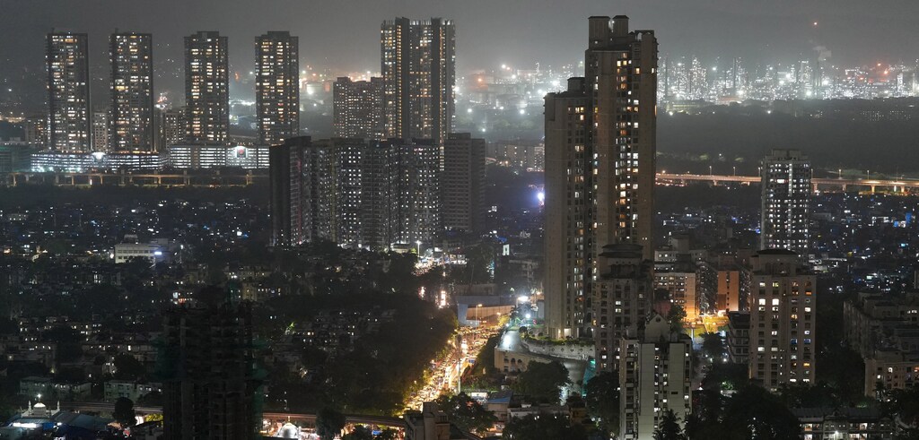 High-rise building are pictured in India's financial capital Mumbai, July 24, 2024. The climate crisis could cost India up to 10% of its national income.