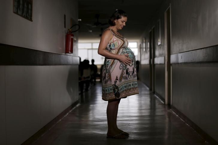 Juliana Gomes, who is eight months pregnant poses for a picture at the IMIP hospital in Recife, Brazil, January 28, 2016. Worried about being infected by the fast-spreading mosquito-borne Zika virus during her pregnancy, Juliana thinks that the birth of her daughter will be a personal victory. Zika infection has been linked to an unprecedented surge in Brazil of cases of newborns with shrunken heads and brain damage. The epidemic of microcephaly has made many Brazilians think twice about getting pregnant. REUTERS/Ueslei Marcelino