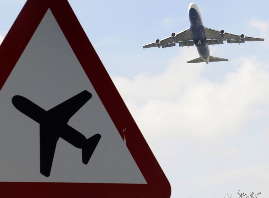 A jumbo jet takes off shortly before midday from Heathrow Airport in west London April 15, 2010. A huge cloud of ash from a volcano in Iceland turned the skies of northern Europe into a no-fly zone on Thursday, leaving hundreds of thousands of passengers stranded. No flights are allowed in British air space, except in emergencies, from 12 p.m. until at least 6 p.m. as the ash spreads across the country, the National Air Traffic Service (NATS) said.REUTERS/Toby Melville (BRITAIN - Tags: TRANSPORT ENVIRONMENT TRAVEL) - LM1E64F12J601