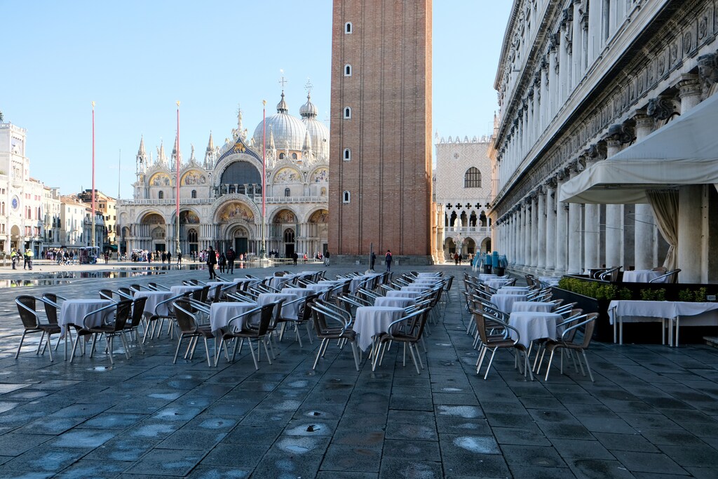 Empty restaurant tables are seen in St. Mark's Square as the Italian government prepares to adopt new measures to contain the spread of coronavirus in Venice, Italy, March 8, 2020.