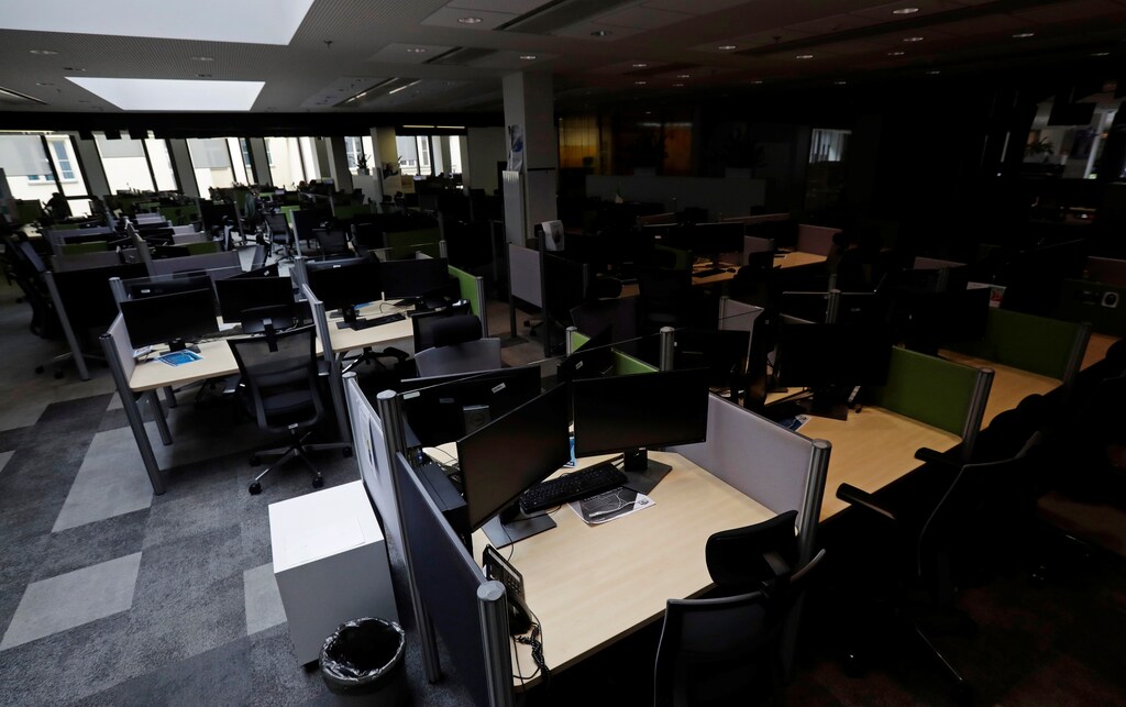 Open office workspace is seen in an empty office of an airline service company Bluelink International, as the spread of the coronavirus disease (COVID-19) continues, in Prague, Czech Republic, May 4, 2020. Picture taken May 4, 2020. REUTERS/David W Cerny - RC2HNG9GH414