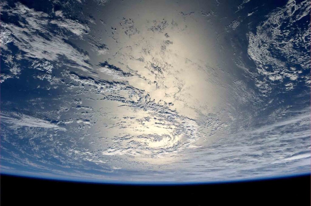 The sun reflects off the water in this picture taken by German astronaut Alexander Gerst from the International Space Station and sent on his Twitter feed July 17, 2014. REUTERS/Alexander Gerst/NASA/Handout via Reuters (OUTER SPACE - Tags: SCIENCE TECHNOLOGY ENVIRONMENT TPX IMAGES OF THE DAY) ATTENTION EDITORS ? THIS PICTURE WAS PROVIDED BY A THIRD PARTY. REUTERS IS UNABLE TO INDEPENDENTLY VERIFY THE AUTHENTICITY, CONTENT, LOCATION OR DATE OF THIS IMAGE. FOR EDITORIAL USE ONLY. NOT FOR SALE FOR MARKETING OR ADVERTISING CAMPAIGNS. THIS PICTURE IS DISTRIBUTED EXACTLY AS RECEIVED BY REUTERS, AS A SERVICE TO CLIENTS - GM1EA7H1Q5F01
