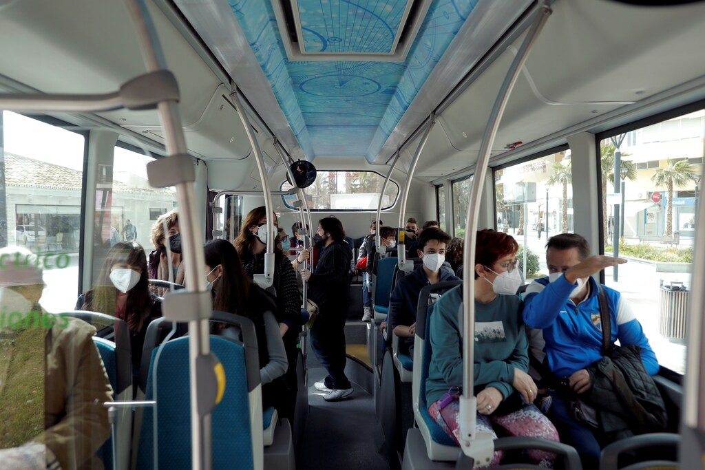 Passengers sit in an electric autonomous bus which is driven in autopilot in Malaga, Spain